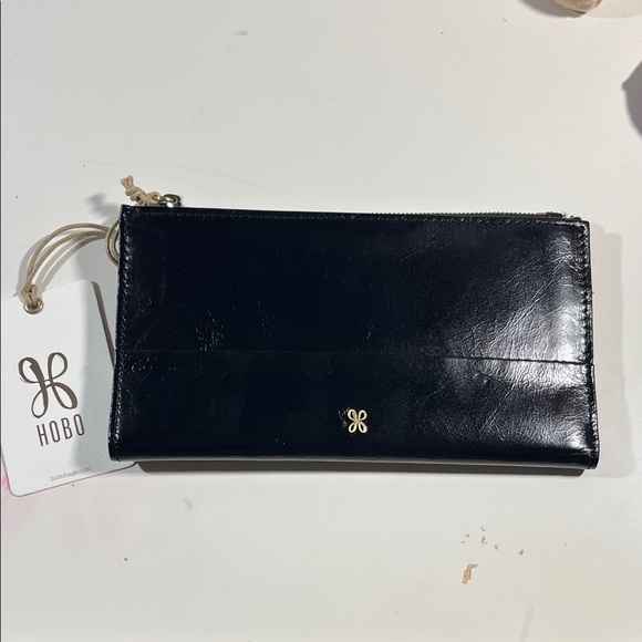 HOBO Handbags - HOBO Shiny Black Leather Clutch